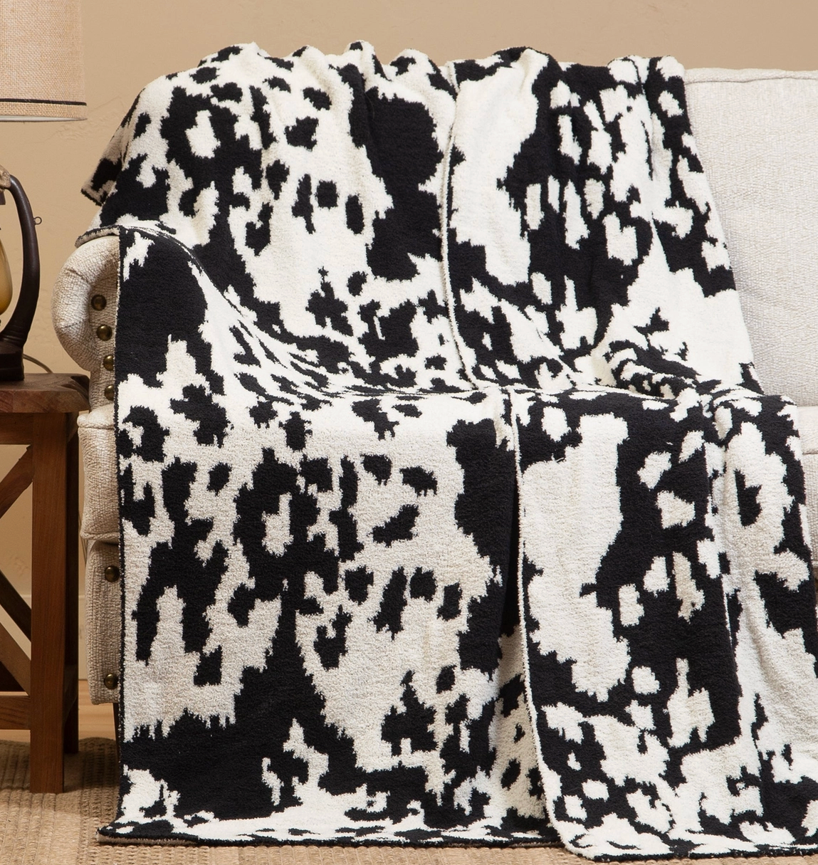 Wrangler Black & White Cowhide Stretchy Throw Blanket