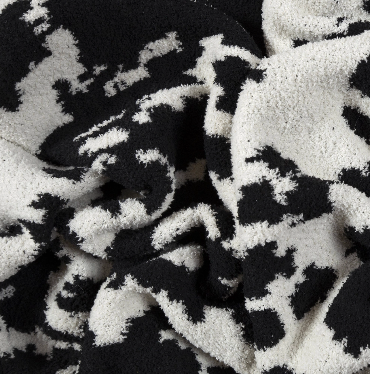 Wrangler Black & White Cowhide Stretchy Throw Blanket